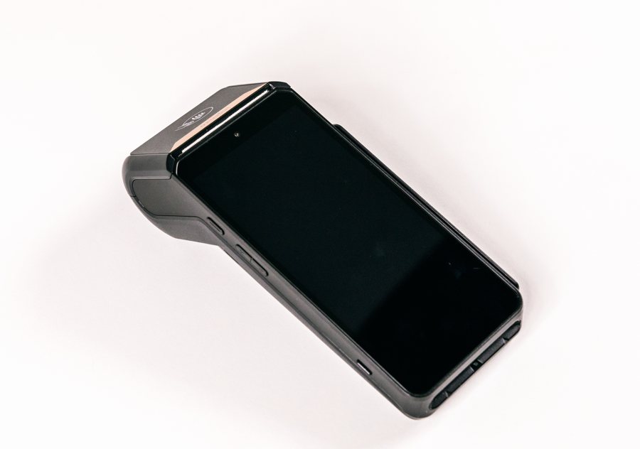 A handheld payment terminal running the point of sale